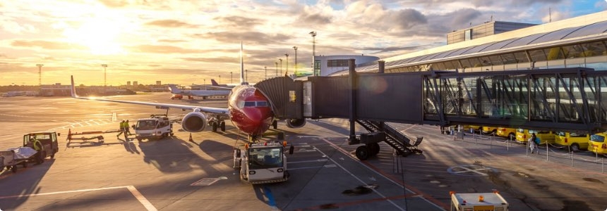 Airplace on the Tarmac Surrounded by GSE