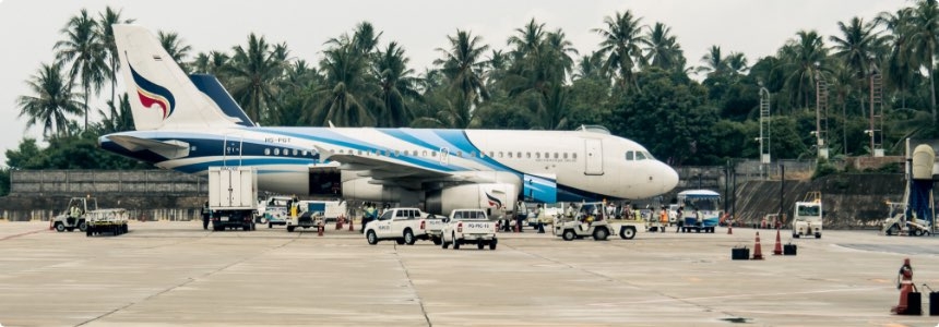 Airplace on the Tarmac Surrounded by GSE